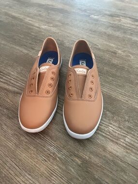 Keds women’s Slip-On Sneakers in Tan